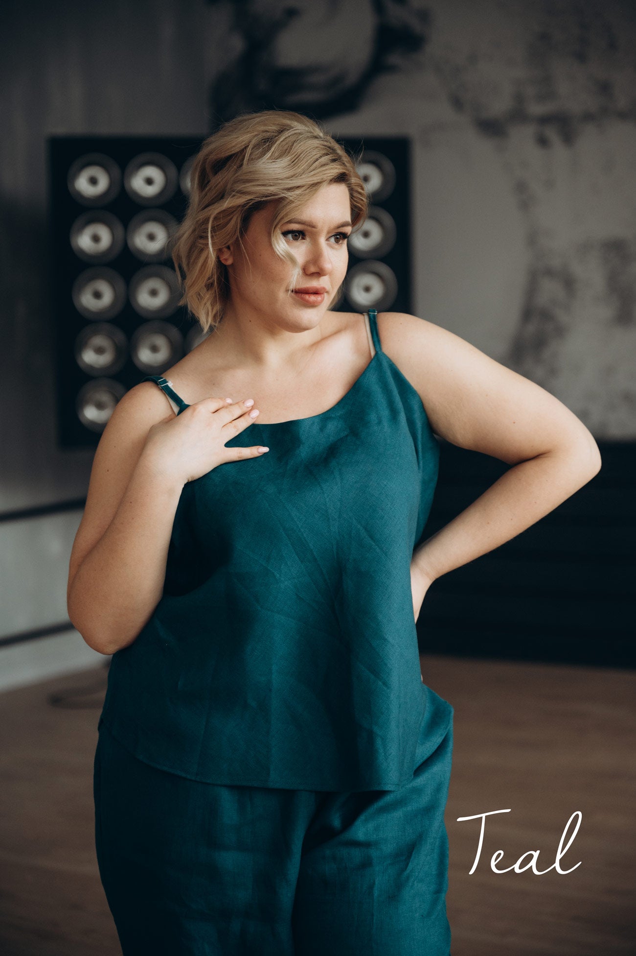 Woman wearing a teal natural linen lounge pajamas