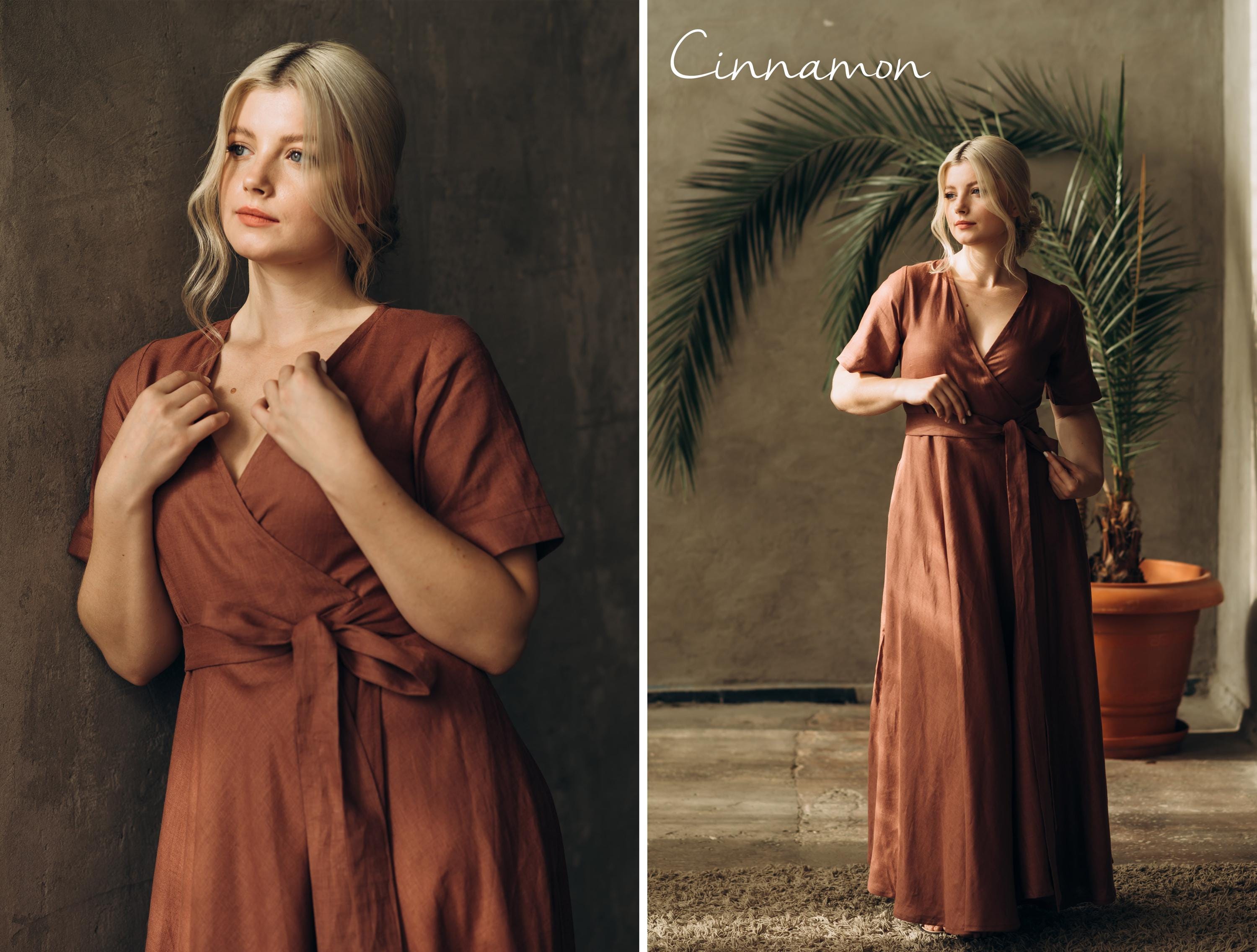 Woman wearing a rust-colored linen midi dress at a friend's wedding.