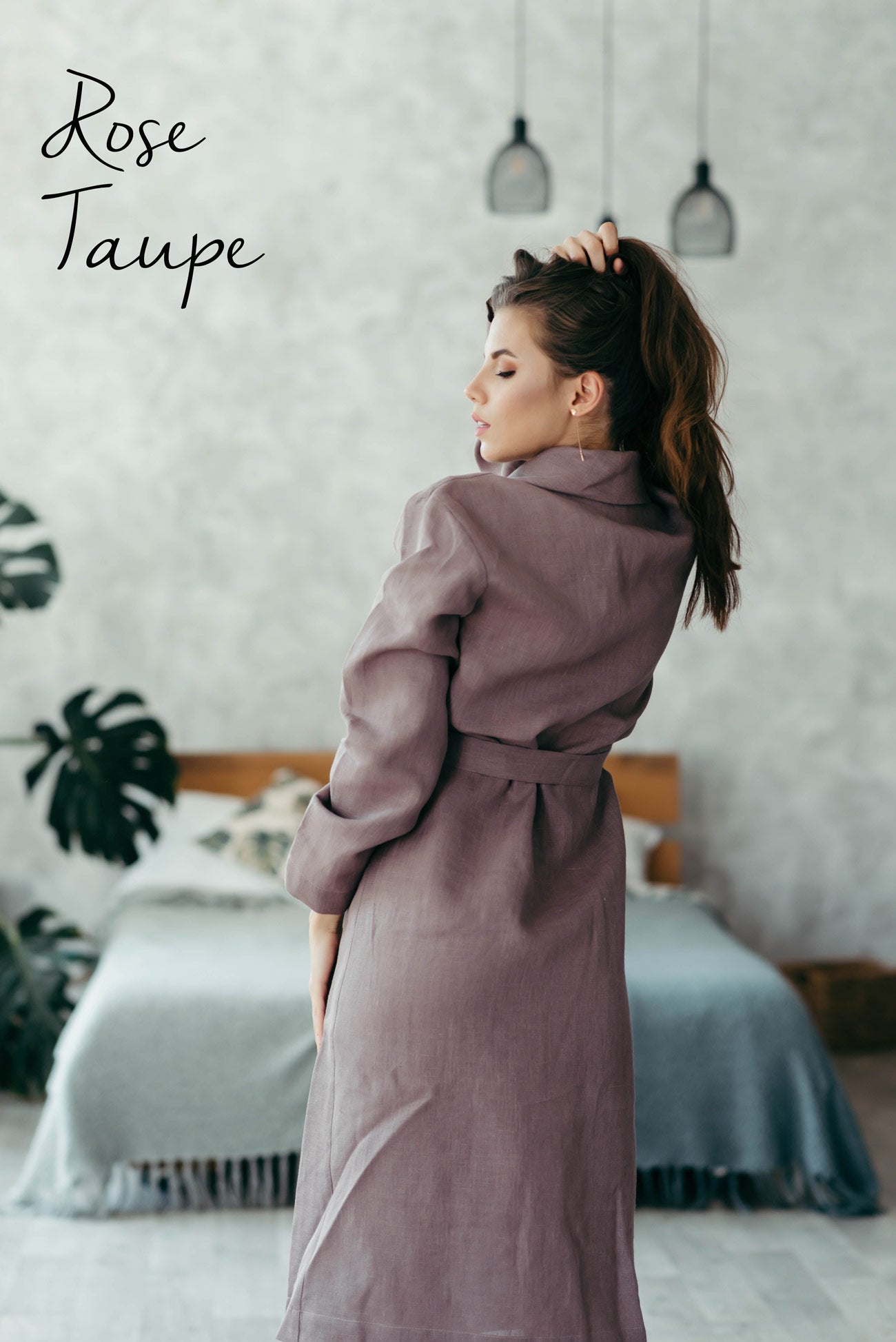 Woman wearing a brown-purple linen bathrobe, sustainable dressing gown.
