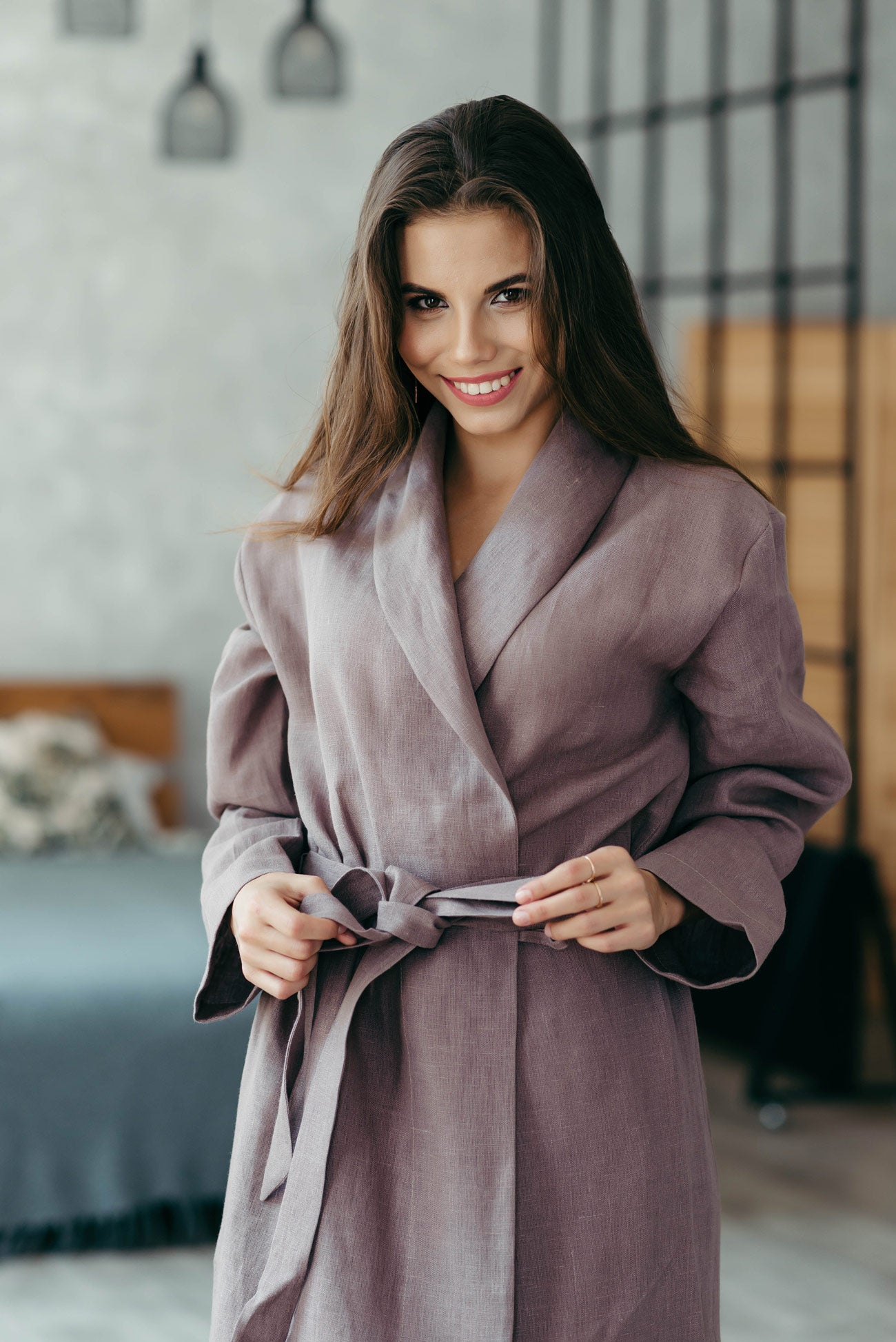 Woman wearing a brown women’s linen dressing gown, long-sleeve sustainable robe.