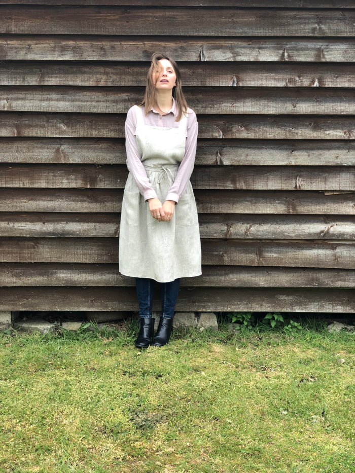 Customer wearing Linen Artist Apron | Cross-Back Pinafore