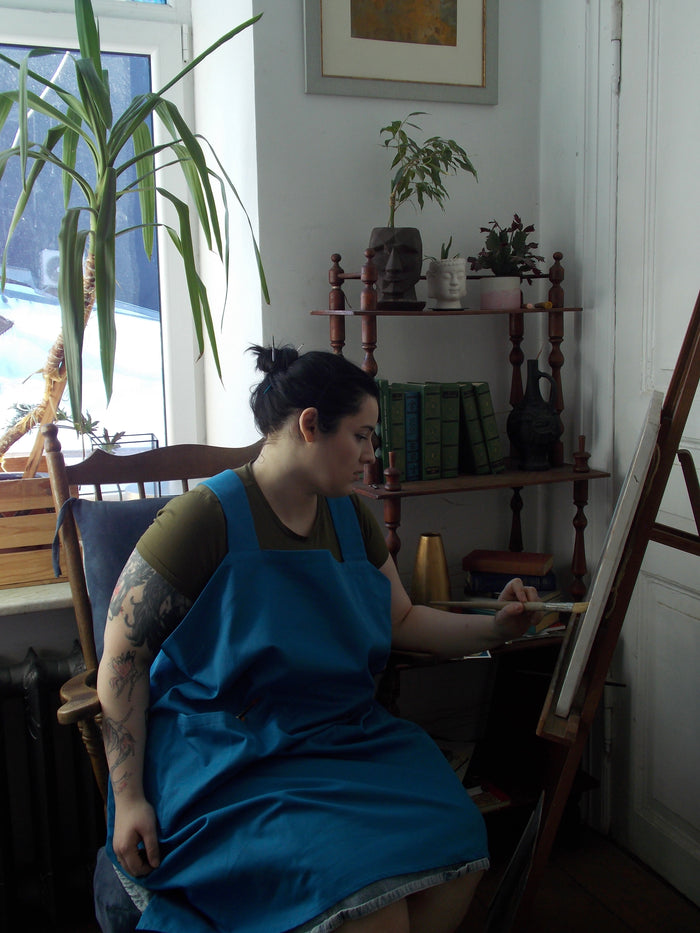 Customer wearing Heavy Duty Smock Apron | Tan