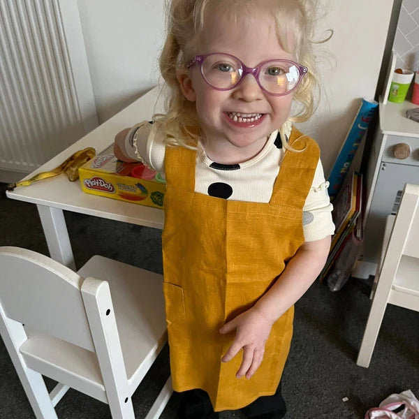 Customer wearing Child’s Linen Smock Apron | Kids Japanese Pinafore