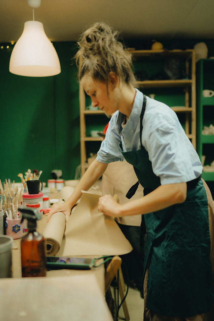 Customer wearing Heavy Duty Cotton Aprons for Potters