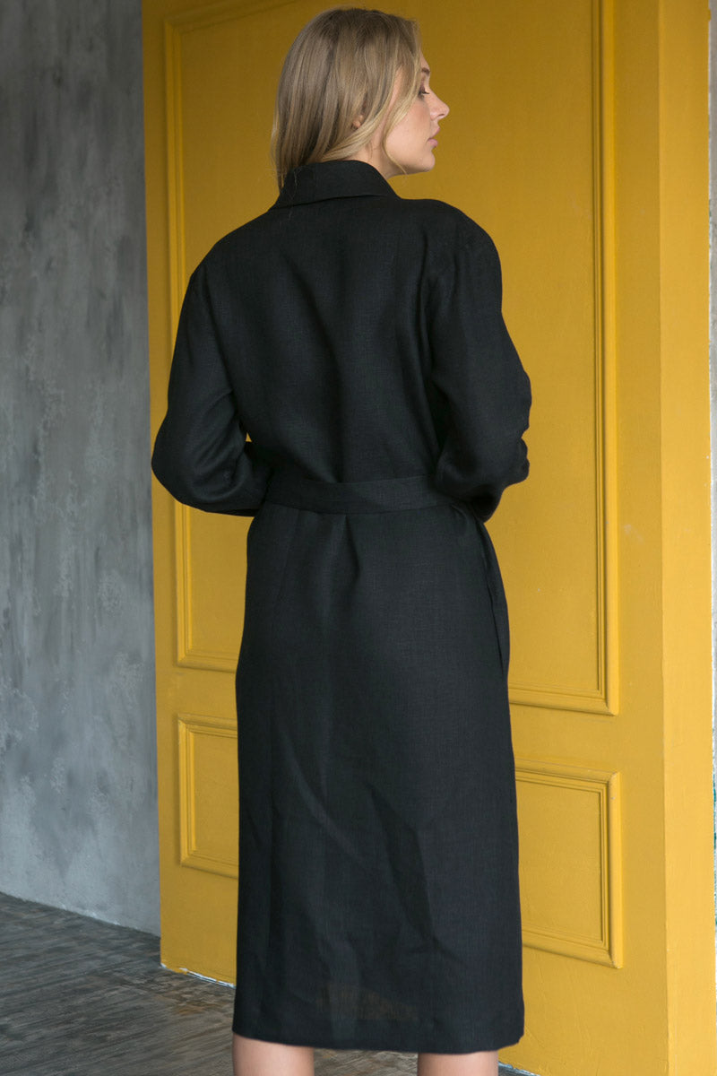 Bride to be wearing a spa linen robe standing in a luxury hotel.